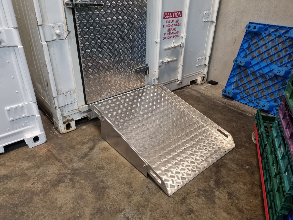 Detail view of aluminium ramp adjustment mechanism and structural components